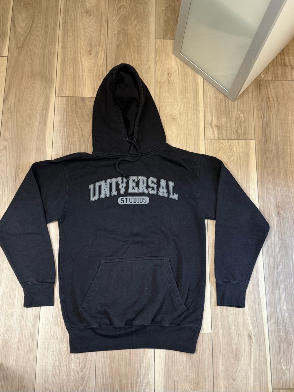 Universal Black Pullover Hoodie with Grey Logo